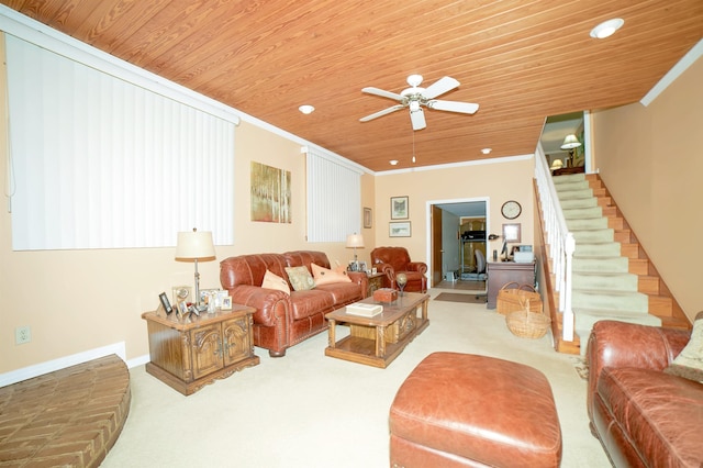 living area with wooden ceiling, crown molding, stairway, and ceiling fan