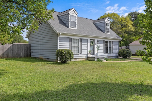 cape cod-style house with a front lawn, fence, and crawl space