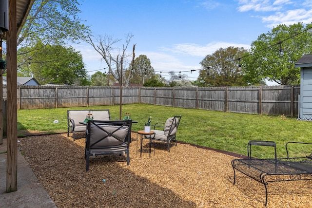 view of yard with a fenced backyard and a patio