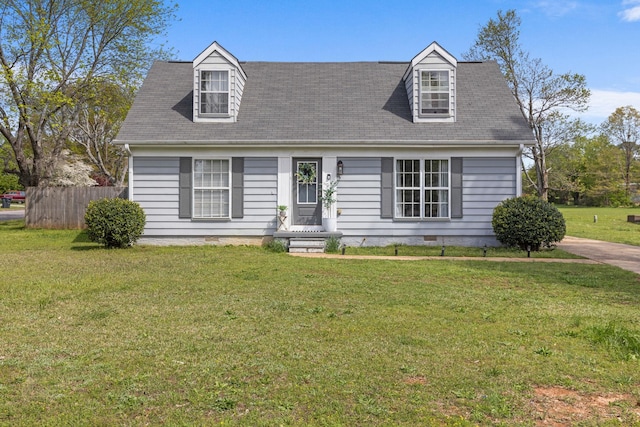 cape cod home with crawl space, fence, and a front lawn