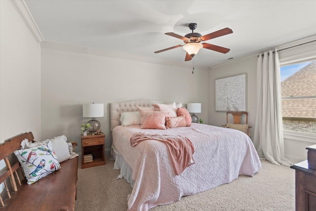  - bedroom with carpet, crown molding, and a ceiling fan