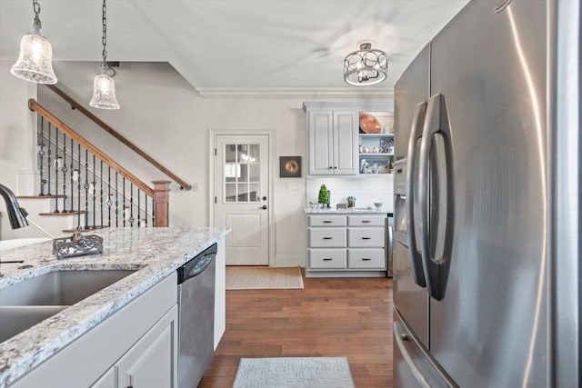  - kitchen featuring stainless steel appliances, a sink, dark wood-type flooring, open shelves, and pendant lighting
