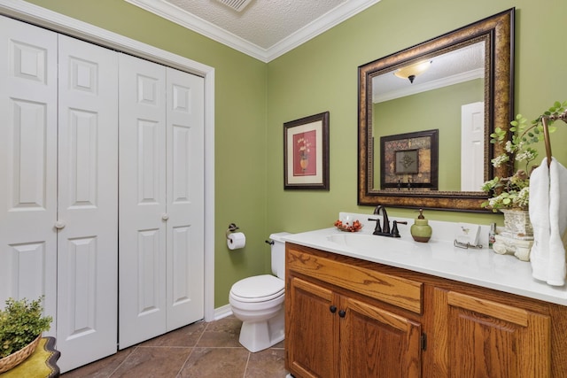 bathroom featuring vanity, crown molding, tile patterned flooring, toilet, and a textured ceiling