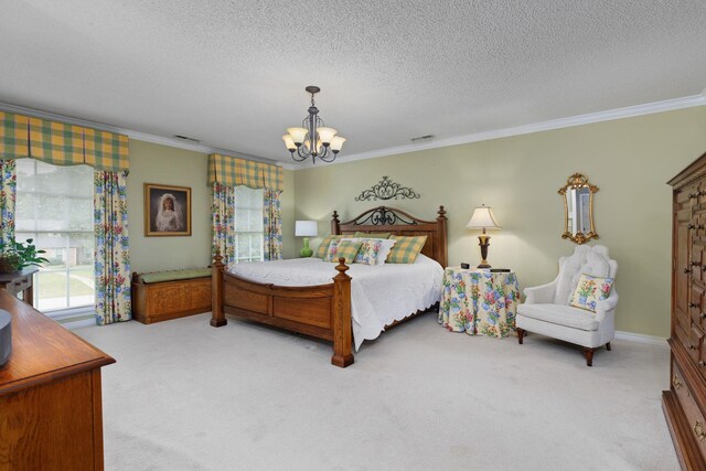 bedroom featuring crown molding, carpet, and a chandelier