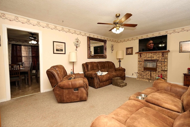 living room with carpet, a textured ceiling, a fireplace, and ceiling fan