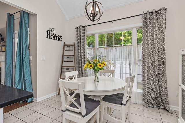  - dining area with ornamental molding, a chandelier, lofted ceiling, light tile patterned floors, and baseboards