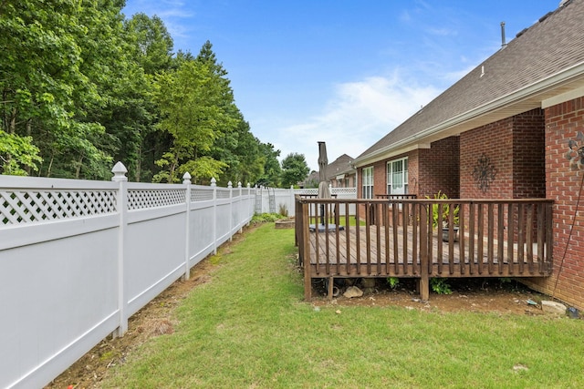  - view of yard featuring a deck
