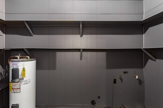  - washroom with laundry area, washer hookup, and water heater