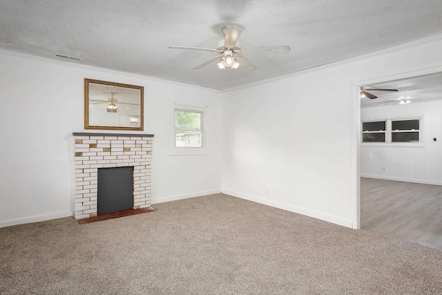  - unfurnished living room featuring ceiling fan, a textured ceiling, and visible vents