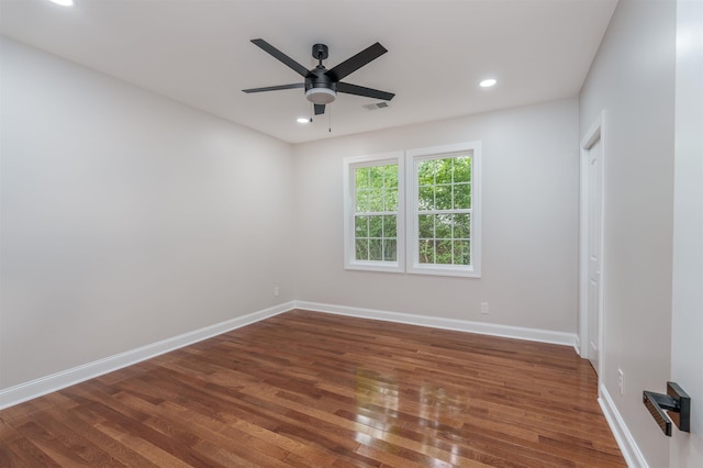 unfurnished room with ceiling fan, dark wood finished floors, baseboards, and recessed lighting