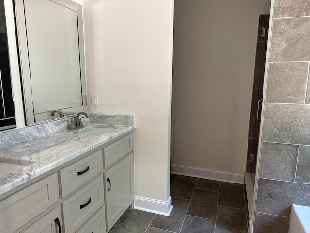 bathroom featuring vanity and walk in shower