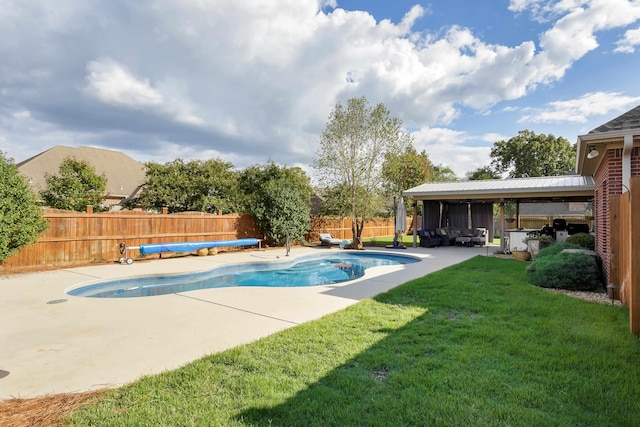 view of swimming pool with a lawn, a patio area, and outdoor lounge area