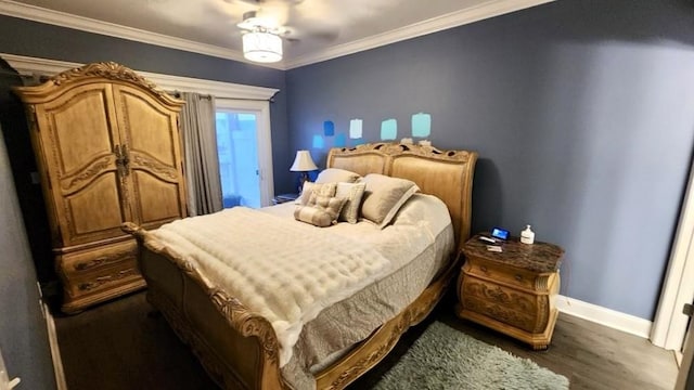 bedroom featuring ornamental molding, dark wood-type flooring, and ceiling fan