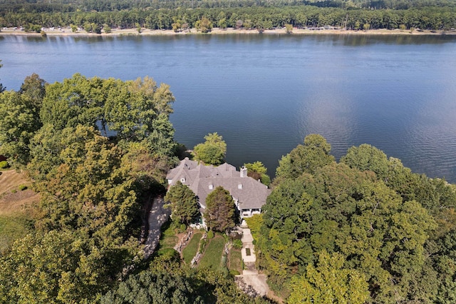  - drone / aerial view featuring a forest view and a water view