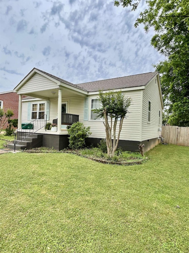 view of front of house featuring crawl space, covered porch, and roof with shingles