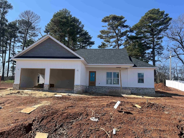 view of front of home with a garage