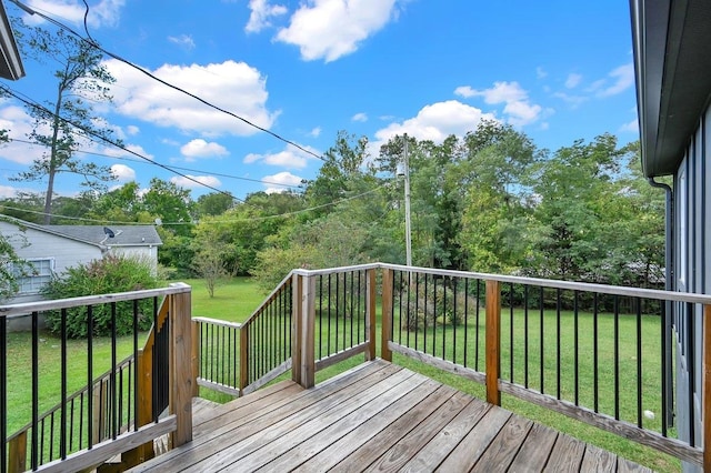 deck featuring a yard