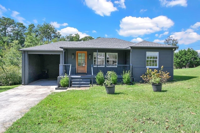 view of front of house featuring a porch, an attached garage, driveway, roof with shingles, and a front yard