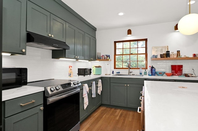 kitchen featuring under cabinet range hood, black microwave, electric range, and open shelves