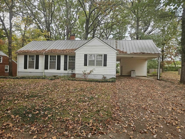 view of front of house with a carport