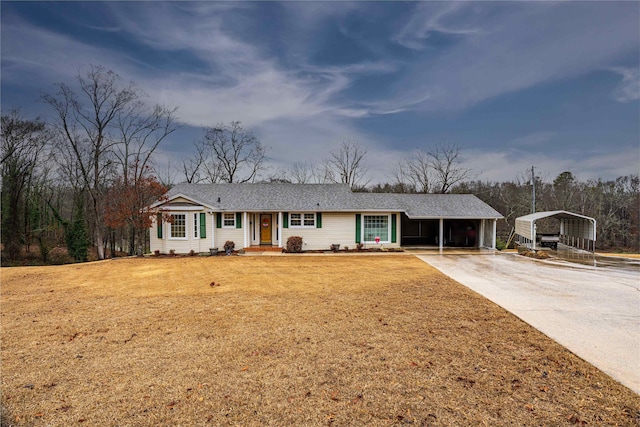 ranch-style house with a front lawn and a carport