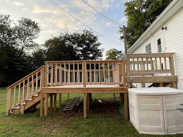 deck featuring a lawn