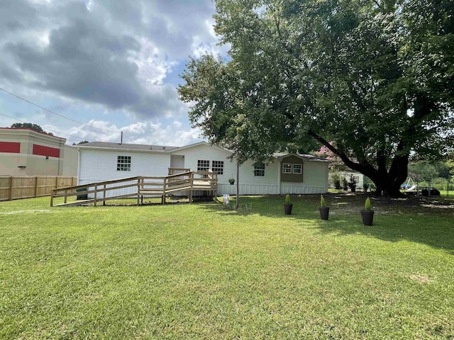 view of yard featuring a deck