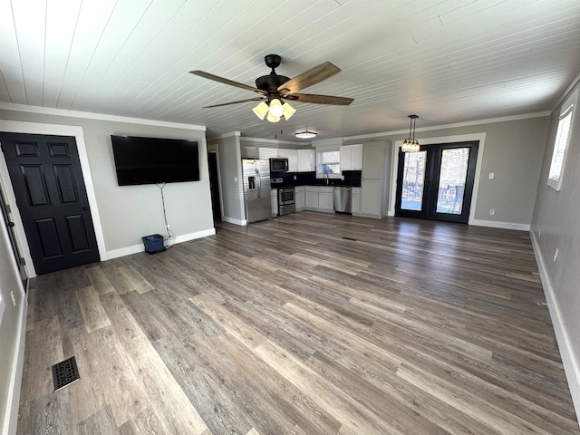 unfurnished living room with sink, crown molding, wooden ceiling, dark hardwood / wood-style flooring, and ceiling fan