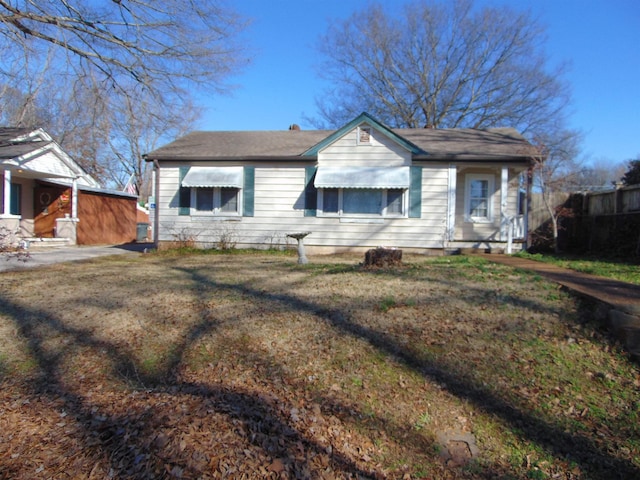 view of front of home with a front yard