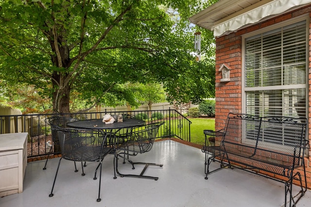  - view of patio / terrace featuring outdoor dining space