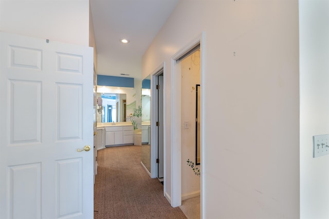  - hall featuring carpet and recessed lighting