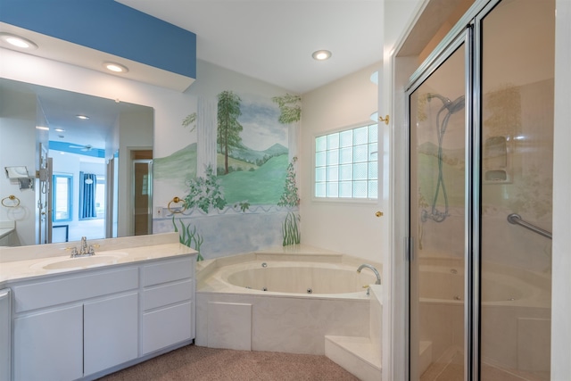  - bathroom with vanity, a stall shower, a jetted tub, and recessed lighting