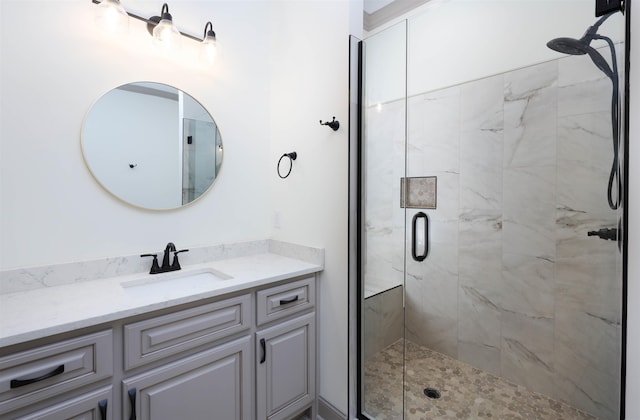 bathroom featuring vanity and walk in shower