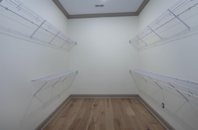 walk in closet featuring light wood-type flooring