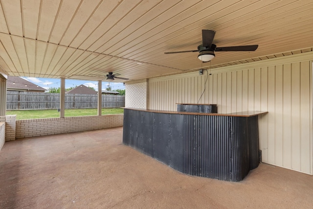  - view of patio featuring ceiling fan