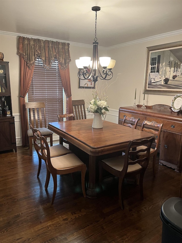  - dining room with a chandelier, ornamental molding, and dark wood-style floors
