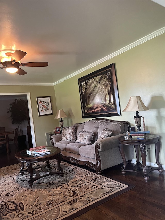  - living room featuring wood finished floors, crown molding, and ceiling fan