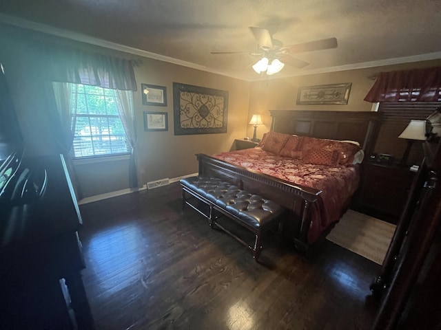  - bedroom with dark wood-style floors, ornamental molding, baseboards, and a ceiling fan