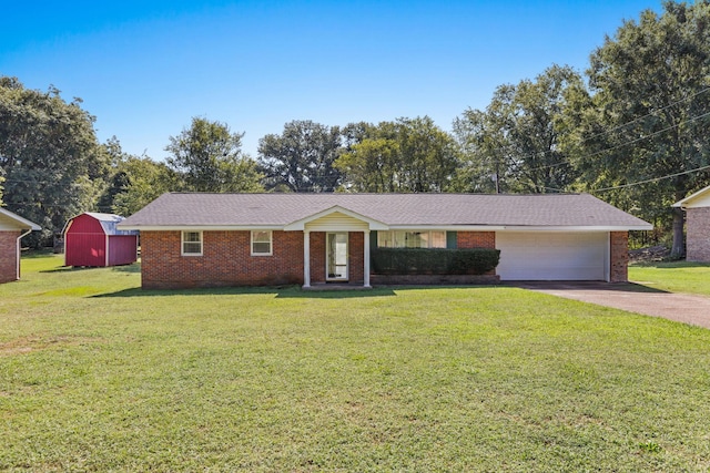 single story home featuring a garage and a front lawn