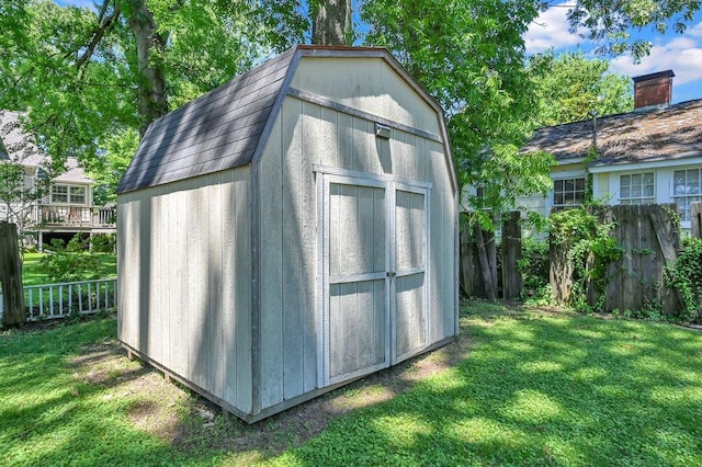  - view of shed featuring a fenced backyard