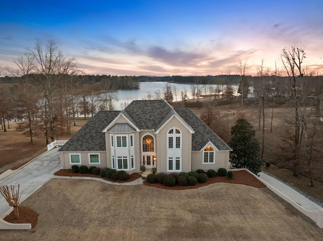 view of front of house featuring a water view