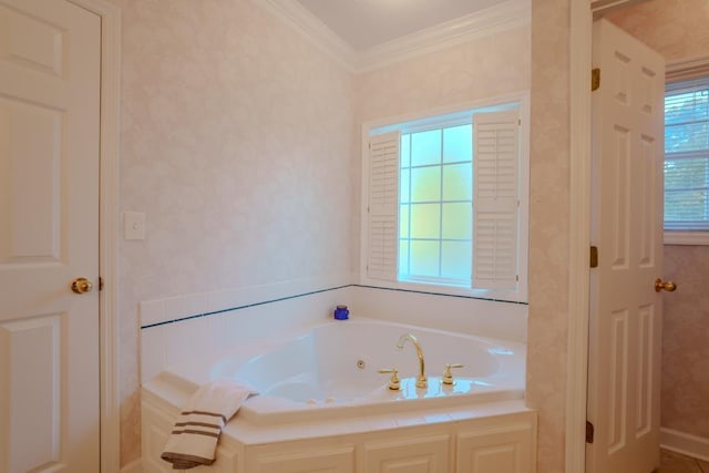 bathroom with a bathtub and ornamental molding