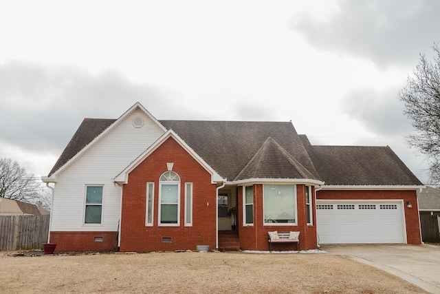 view of front of property featuring a garage