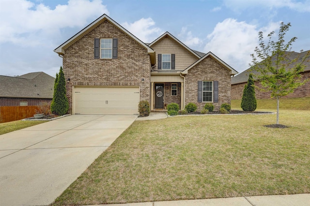 view of front of property featuring a front lawn and a garage