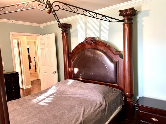 bedroom featuring ornamental molding