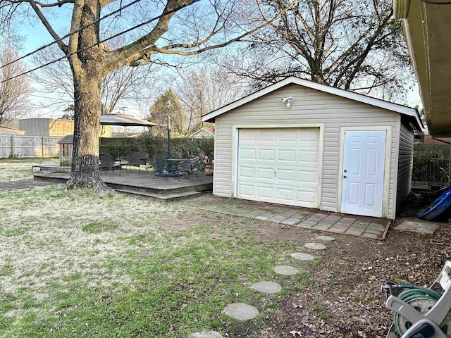 garage with fence