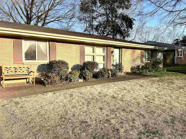 view of front of property with brick siding