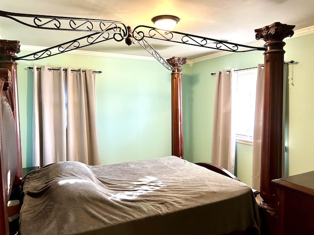 bedroom with ornamental molding