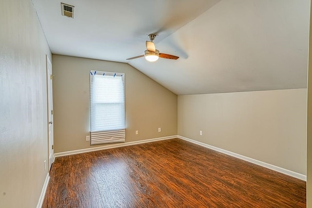 additional living space with ceiling fan, dark hardwood / wood-style flooring, and lofted ceiling