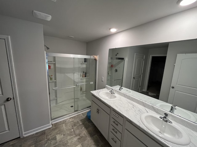 bathroom with vanity and walk in shower